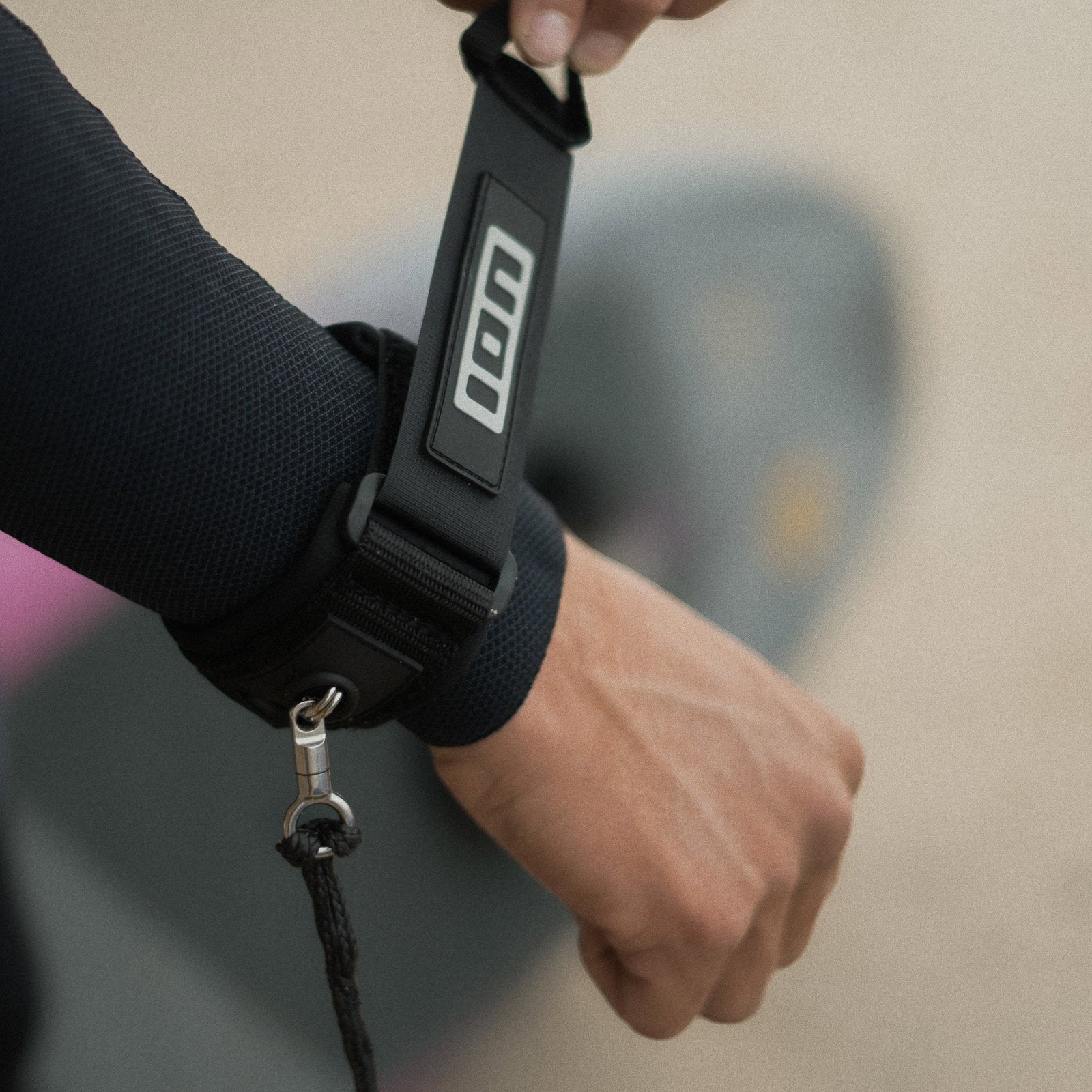 ION Wing Leash Core Wrist Black - studio shot - GearFreak