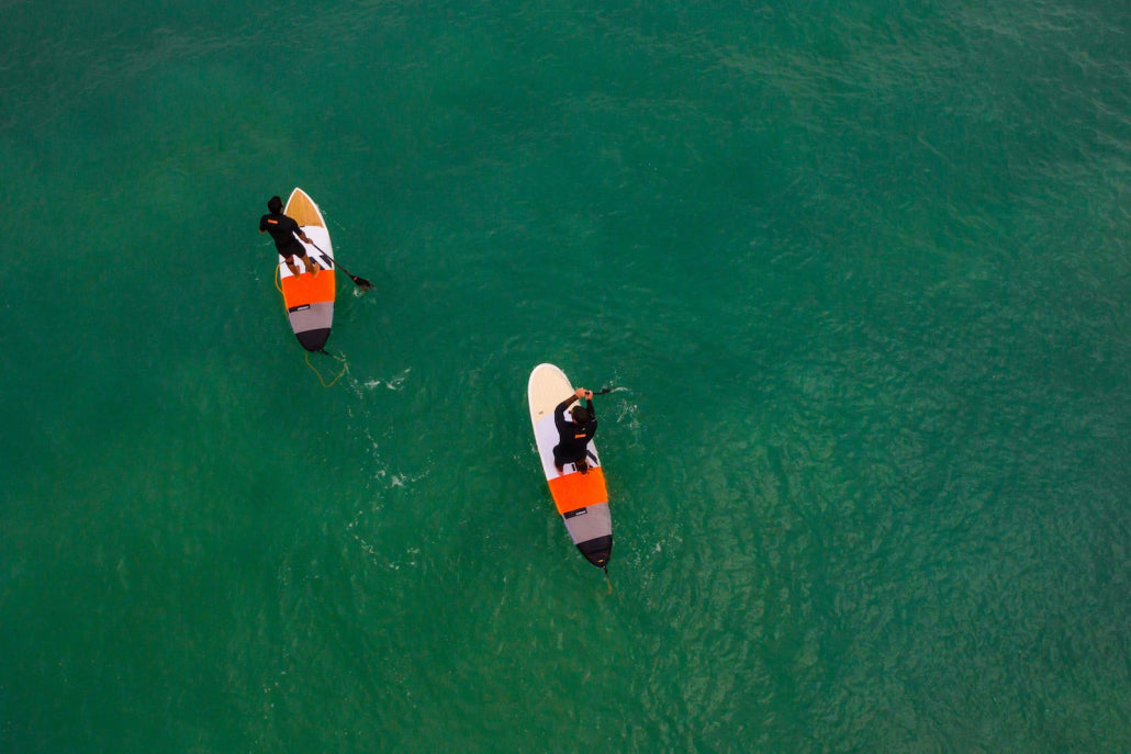 Twee suppers op RRD Longsup-boards op zee, van bovenaf