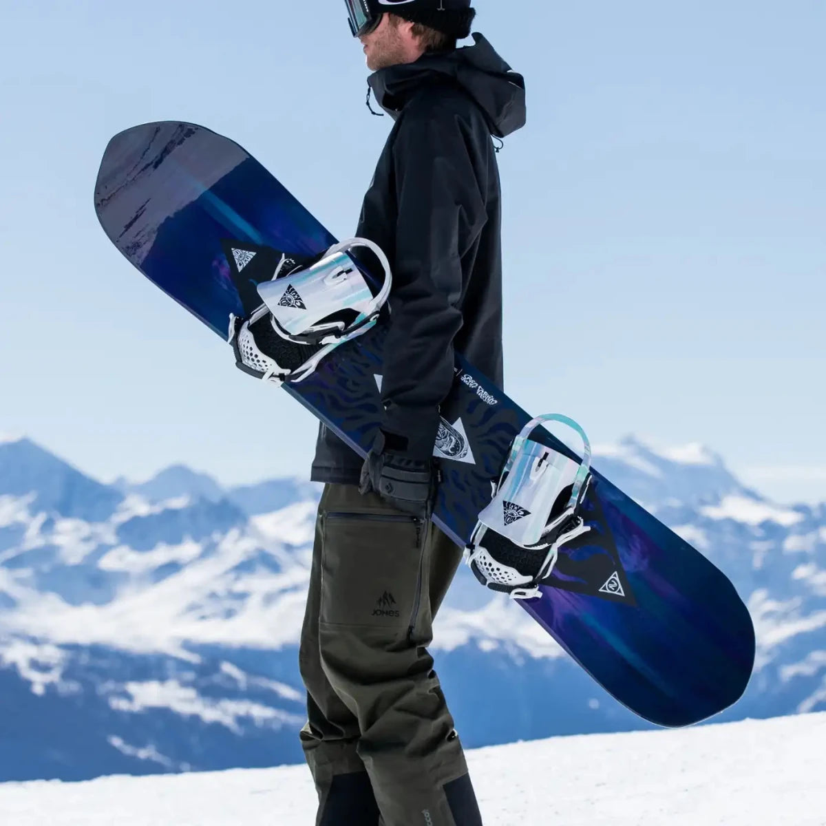 Nidecker Gamma APX paars-blauw, rider met board in de bergen